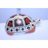 A Royal Crown Derby paperweight a Tortise with silver stopper