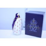 A Royal Crown Derby boxed paperweight, penguin gold stopper