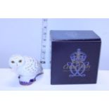 A Royal Crown Derby boxed paperweight, Snowy Owl with gold stopper