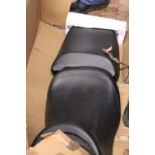 A new boxed motorbike seat. Shipping unavailable