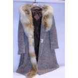 A Herringbone wool coat with fur collar