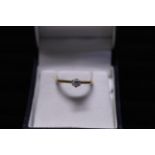 A 18ct gold & diamond solitaire ring. GW 2.59 grams