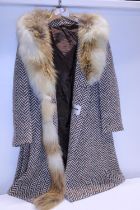 A Herringbone wool coat with fur collar