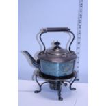 A silver plated spirit kettle with burner