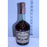 A vintage sealed bottle of Hennessey Cognac