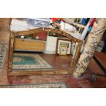 A large gilt framed over-mantle mirror. Shipping unavailable