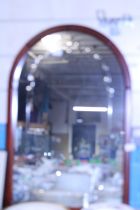 A vintage arch framed mirror, shipping unavailable