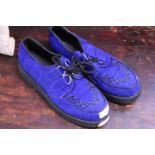 A pair of Blue suede shoes size 11