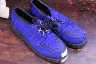 A pair of Blue suede shoes size 11