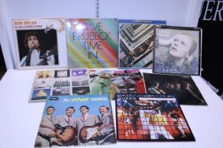 Nine collectable LP records including Pink Floyd, David Bowie, Rolling Stones etc