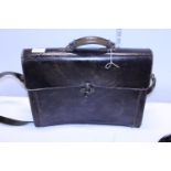 A vintage leather attache case