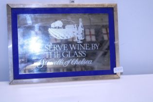 A advertising mirror for Stowell's of Chelsea. No shipping.