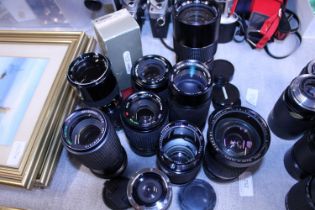A job lot of assorted 35mm camera lenses etc