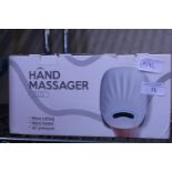 A boxed hand massager (untested)