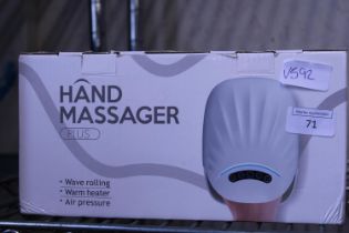 A boxed hand massager (untested)