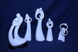 Five collectable circle of love figurines by Kim Lawrence