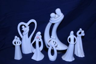 Seven collectable circle of love figurines by Kim Lawrence