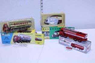 Three boxed die-cast truck models