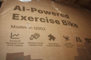 A boxed A1 powered exercise bike (unchecked). Shipping unavailable