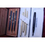 Two cased Papermate pen sets (one box broken) and a 14ct gold nib fountain pen (missing lid)