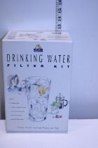 A boxed drinking water filter kit