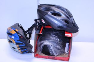 Three cycling helmets