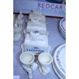 A selection of Lurpack advertising ceramics