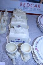 A selection of Lurpack advertising ceramics