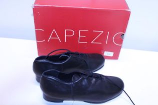 A new pair of tap shoes 11.5