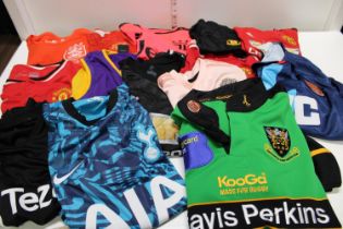 A selection of assorted sized sports shirts
