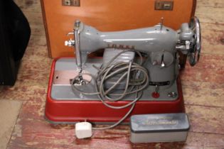 A vintage Jones electric sewing machine. Shipping unavailable