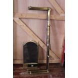 A brass adjustable fire fender and brass fire screen, shipping unavailable