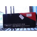 A boxed Kenwood car radio/CD player