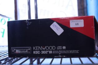 A boxed Kenwood car radio/CD player