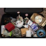 A suit case with contents of collectables. Shipping unavailable