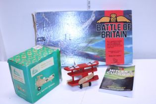 A boxed vintage Battle of Britain board game and two other military related items