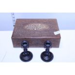 A Anglo-Indian carved box and two small Ebony candlesticks