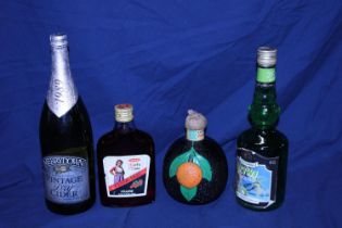 Four bottles of sealed vintage alcohol, shipping unavailable