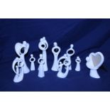 Ten collectable circle of love figurines by Kim Lawrence