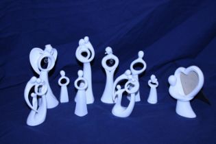 Ten collectable circle of love figurines by Kim Lawrence