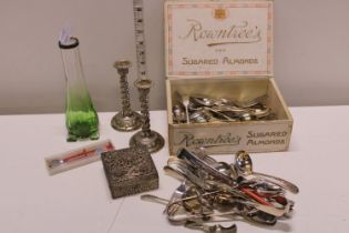 A job lot of assorted flatware and other items