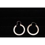 A pair of 9ct gold round form earrings 1.90 grams