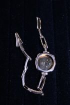 A vintage 9ct gold watch body and strap 6.03g