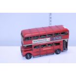 A tin plate London bus model