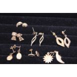 Seven pairs of 9ct gold earrings 2.71 grms total