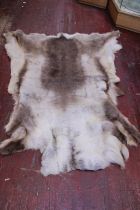 A long hair deer rug 152x152cm approx.