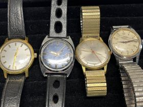 Four vintage gents watches (running when tested)