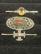 Three vintage silver brooches