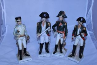 Four ceramic military figures