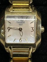A Tissot T Wave ladies watch (needs battery)